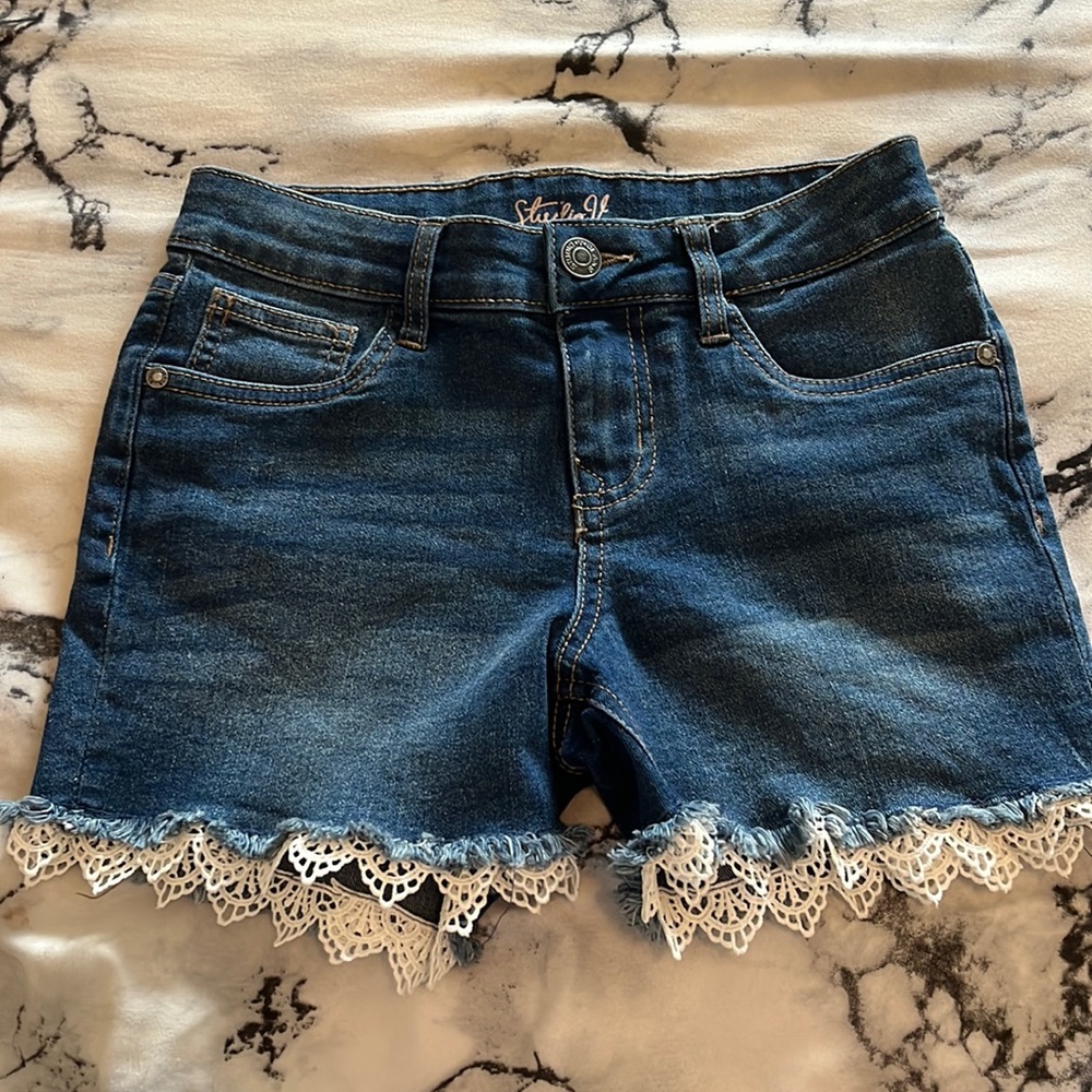 Never worn laced jean shorts.